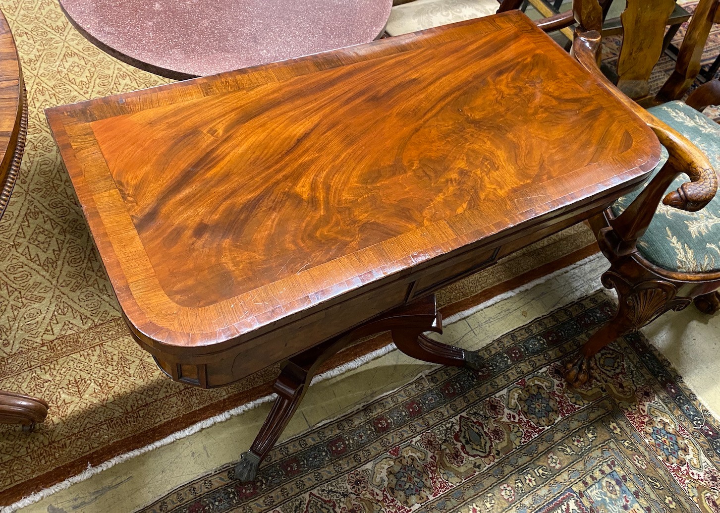 A Regency banded mahogany folding card table, width 90cm, depth 45cm, height 73cm